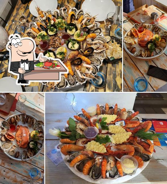 Order different seafood items offered by La Madrague