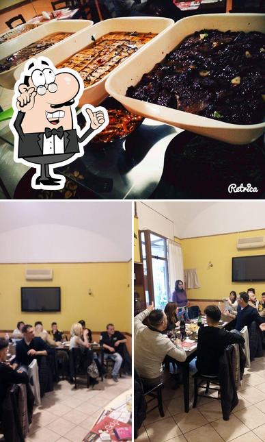 La foto di interni e pizza da Peccati di Gola