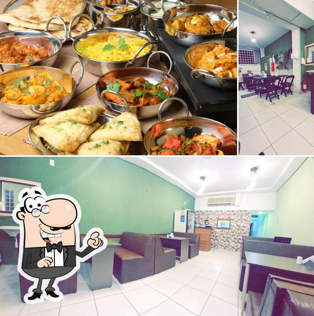 Dê uma olhada a imagem apresentando interior e comida no New Delhi Indian Restaurant