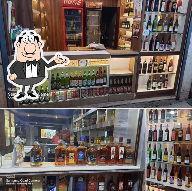 This is the picture depicting interior and beverage at Hotel New Samarth