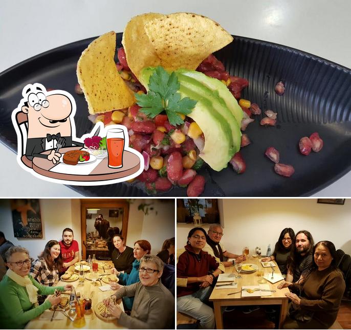 Las fotos de comedor y los ciudadanos en La Huella Vegana de Alcalá de Henares