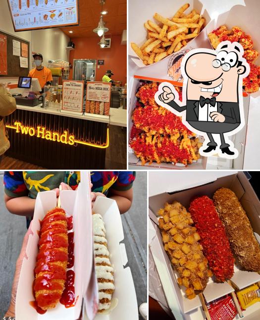 Take a seat at one of the tables at Two Hands Fresh Corn Dogs