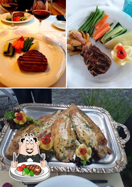 Prova i piatti di carne a La Grotte Restaurant-Sierre