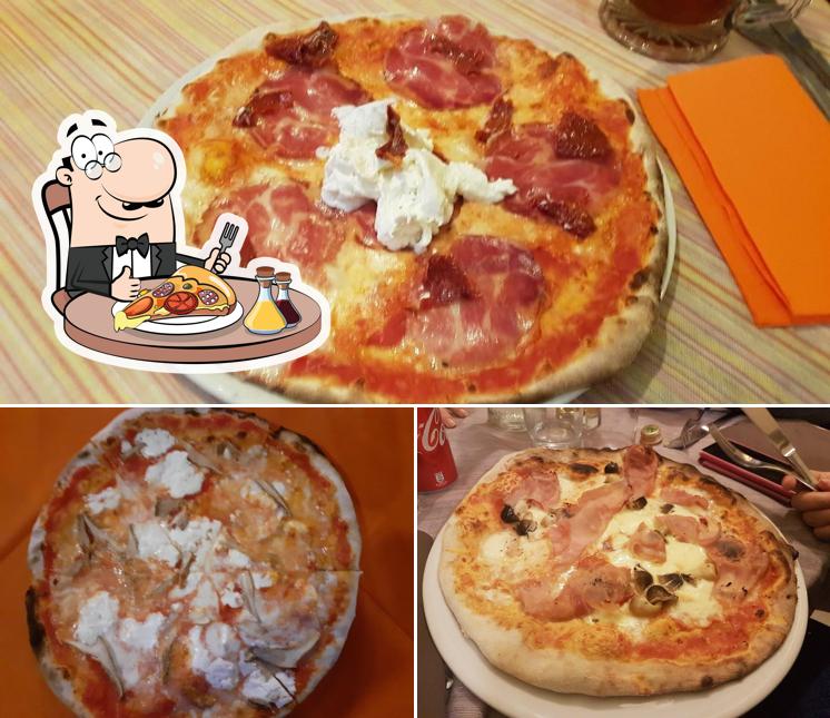 Essayez des pizzas à La Taverna del Merlino