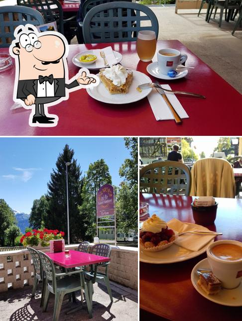 Siediti a un tavolo di Bäckerei Tea-Room Bel-Air