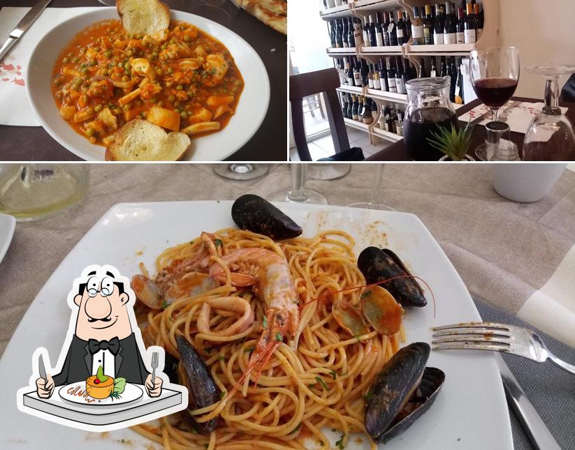 Ristorante Pizzeria La Maison La Caletta si caratterizza per la cibo e vino