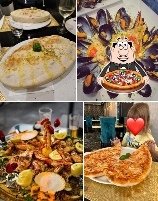 Prova una pizza a Toscanini Restaurant