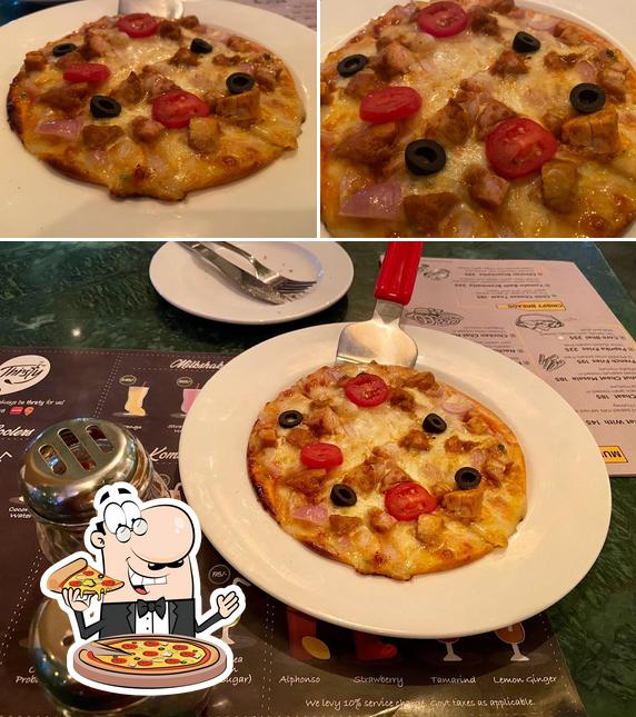 Try out pizza at The Beer Café