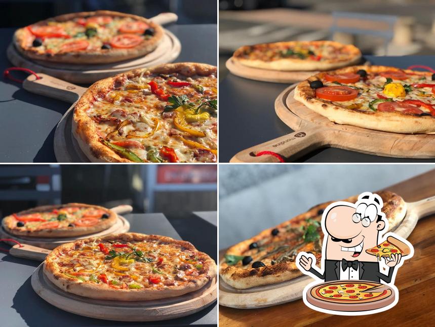 A DISTRICT PIZZA, vous pouvez essayer des pizzas