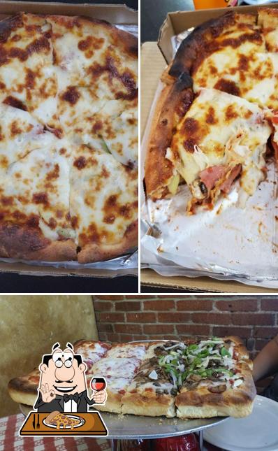 Закажите пиццу в "The Kitchen Italian Cafe & Pizzeria"