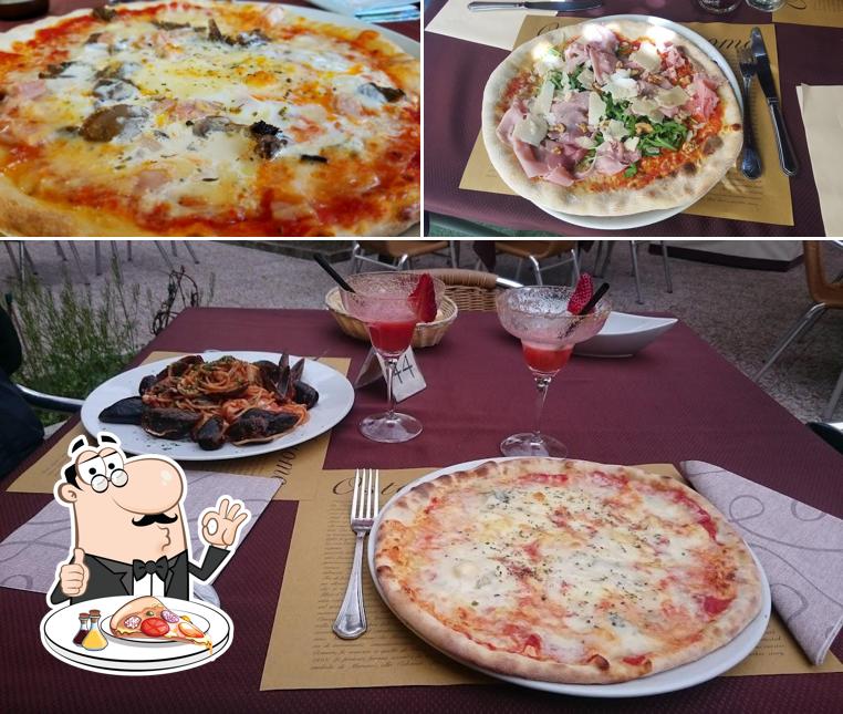 En Osteria Al Duomo, puedes saborear una pizza