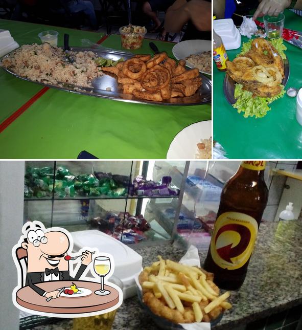 Esta é a imagem mostrando comida e cerveja a Restaurante Rei do Peixe Padre Anchieta