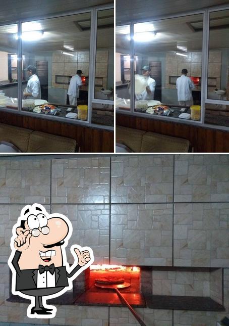 O interior do Disk pizza CITTA DELLA PIZZA