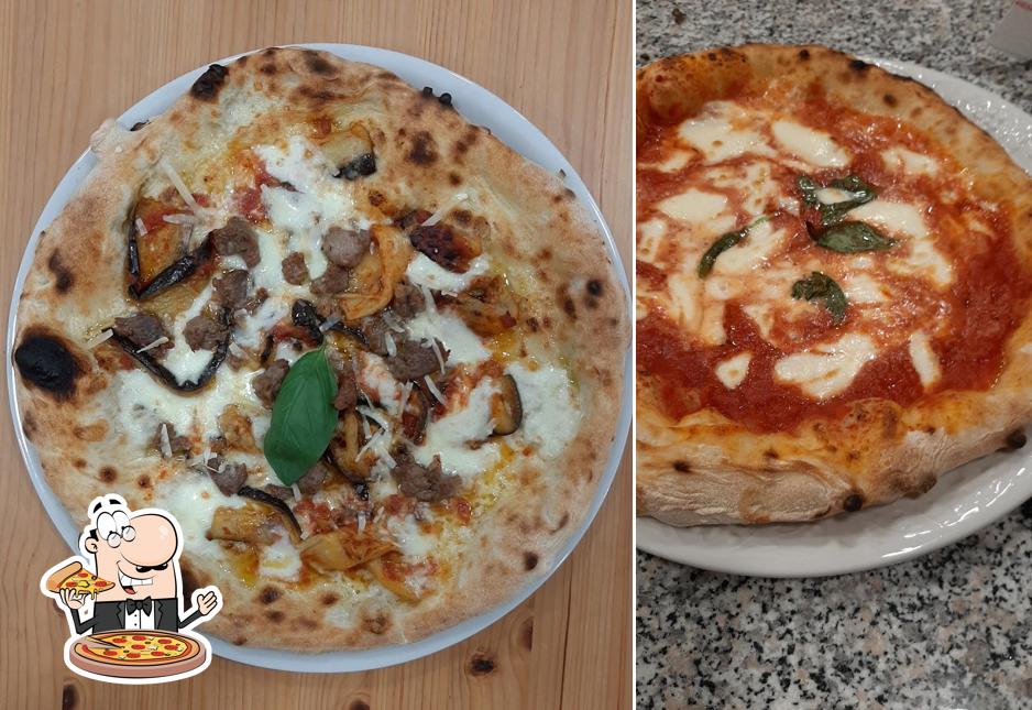 A Pizzeria Reginè, puoi prenderti una bella pizza