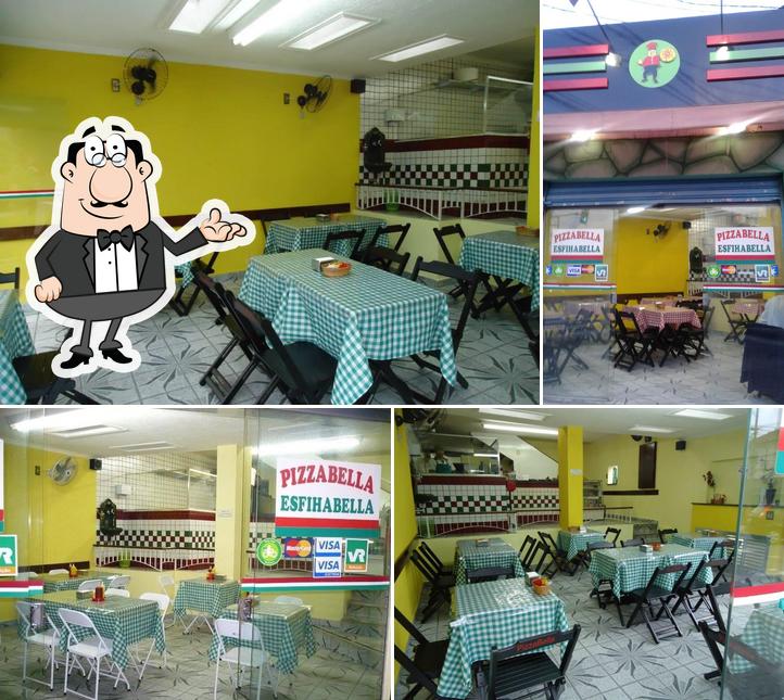 Sente em uma das mesas no Pizzabella Esfihabella