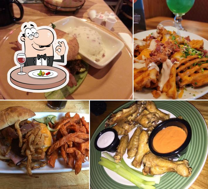 Hamburger, pulled pork sandwich and chicken wings at Applebee's Grill + Bar