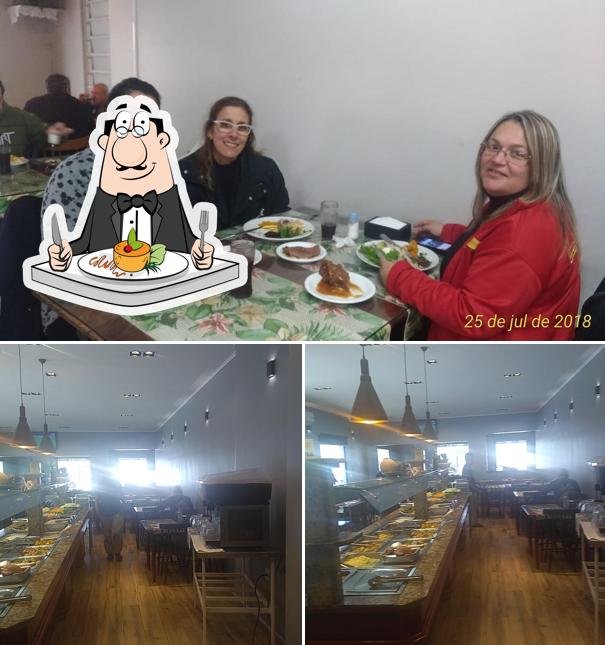 Confira a foto mostrando comida e interior no Restaurante Chies