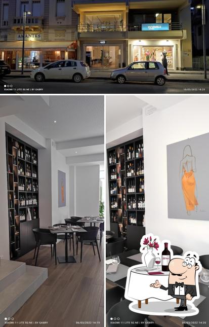 Hugs - Enoteca Innovativa se distingue par sa table à manger et extérieur