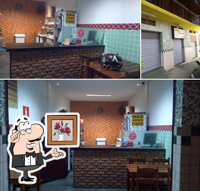 O interior do Mais pizzaria