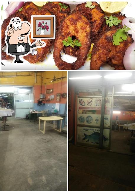 The photo of interior and food at AKC FISH WORLD AND FRY CENTRE