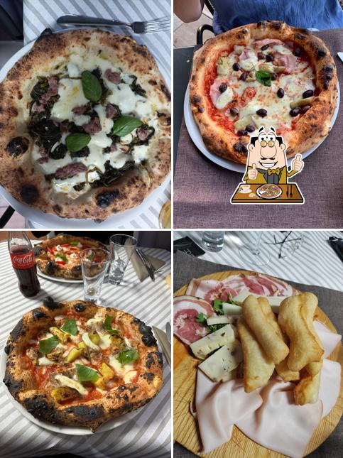 Prenditi una pizza a La Nuova Partenope Ristorante e pizzeria