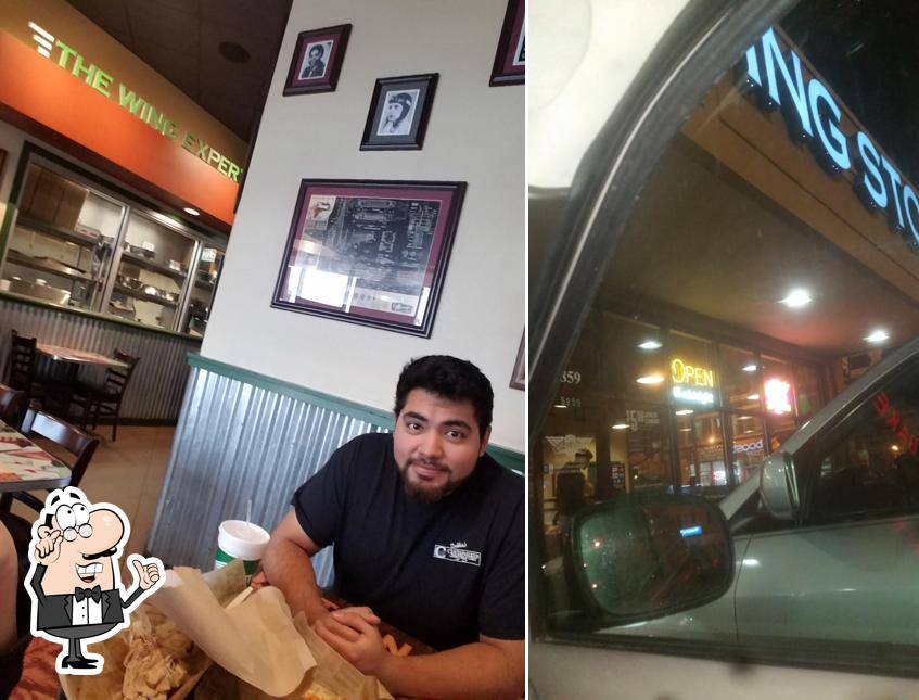 Take a seat at one of the tables at Wingstop