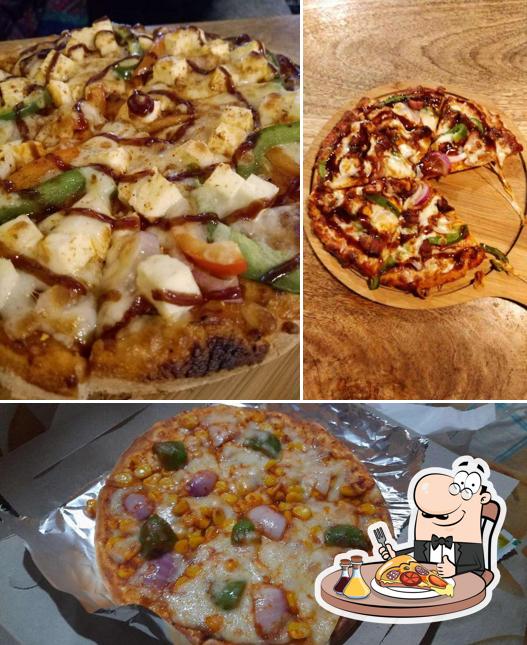 Pick pizza at Tanishq Bakers And Continental