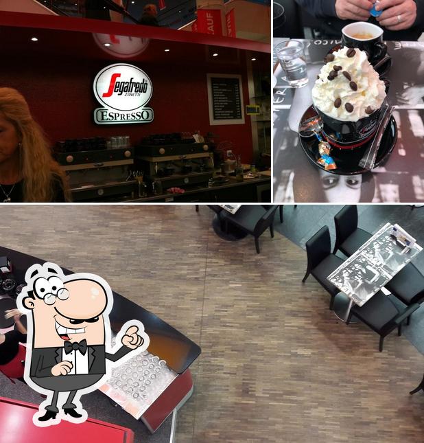 Guarda la foto che raffigura la interni e dolce di Segafredo Zanetti Espresso