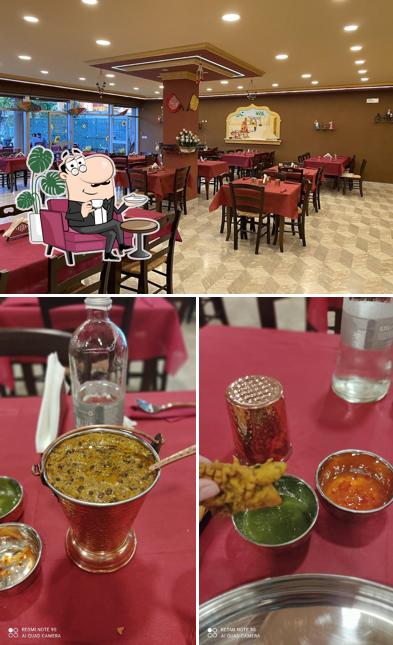 Guarda la immagine che presenta la interni e cibo di Spicy India