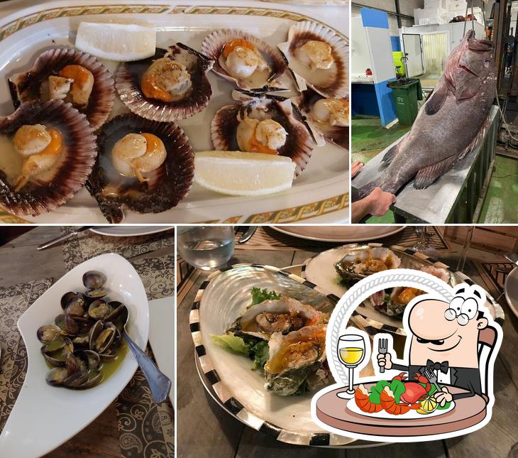 Get different seafood dishes offered by Restaurante La Gruta de Jose