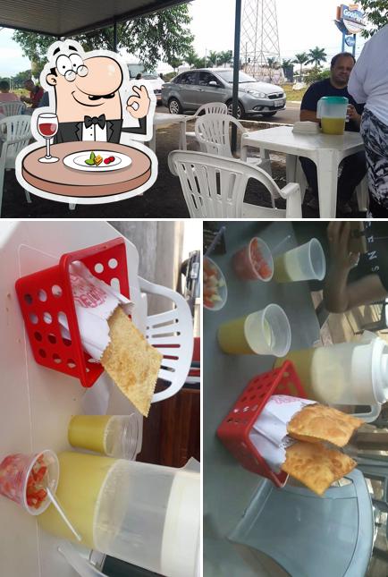 Confira a foto ilustrando comida e interior no Caldo De Cana Garapão