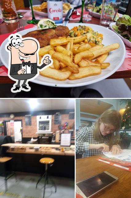 The picture of Restaurant Aux Halles du Marché’s interior and fries