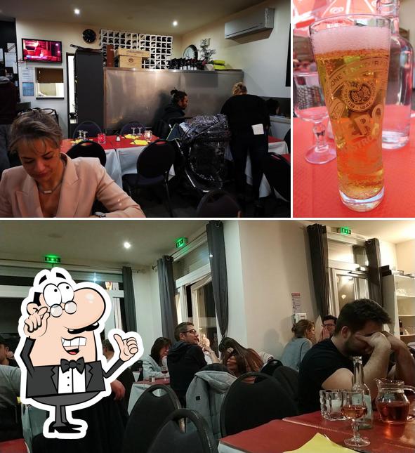 Parmi les diverses choses de la intérieur et la bière, une personne peut trouver sur Restaurant pizzeria Bella Napoli