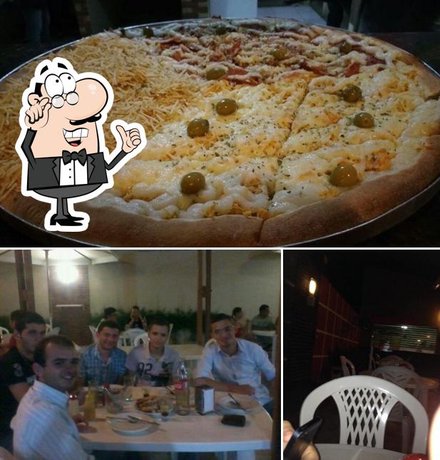 Entre diferentes coisas, interior e pizza podem ser encontrados a Pizzaria Tarandella