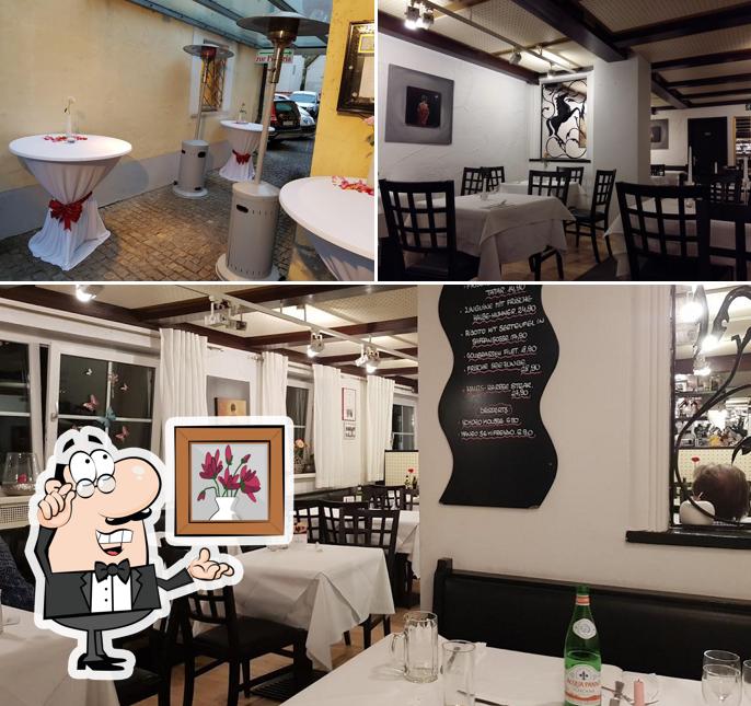 Die Inneneinrichtung von Ristorante- Pizzeria Cavallino Gaststätte