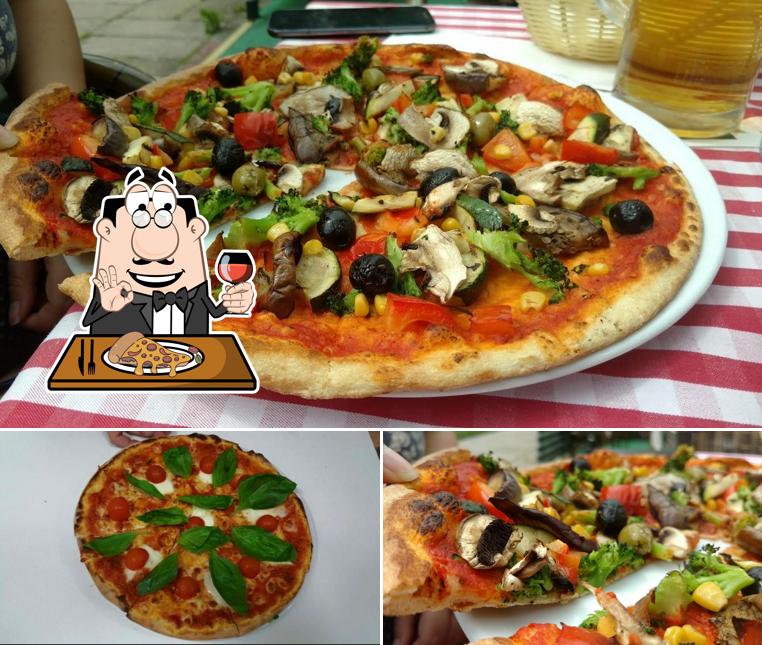En Trattoria Garibaldi, puedes disfrutar de una pizza