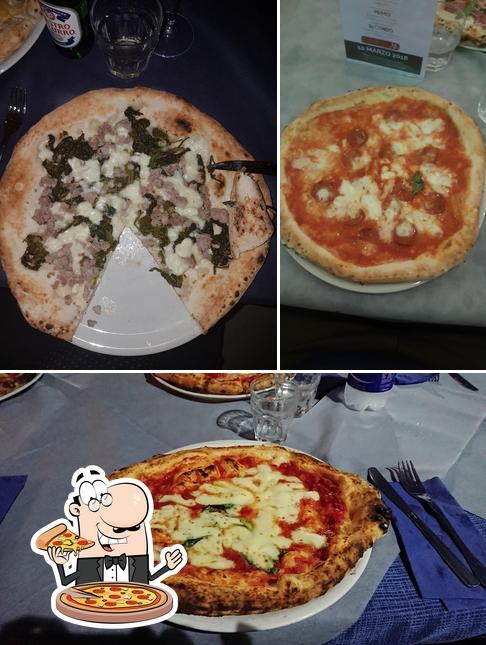 Prenditi una pizza a Nuova Cucina Organizzata