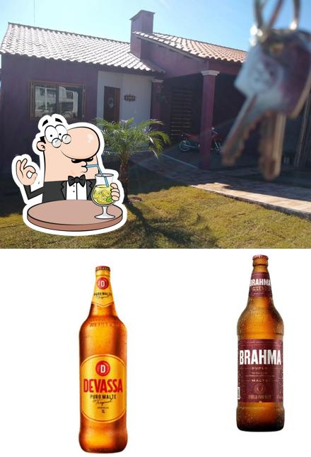 Confira a ilustração mostrando bebida e exterior no Mila beer