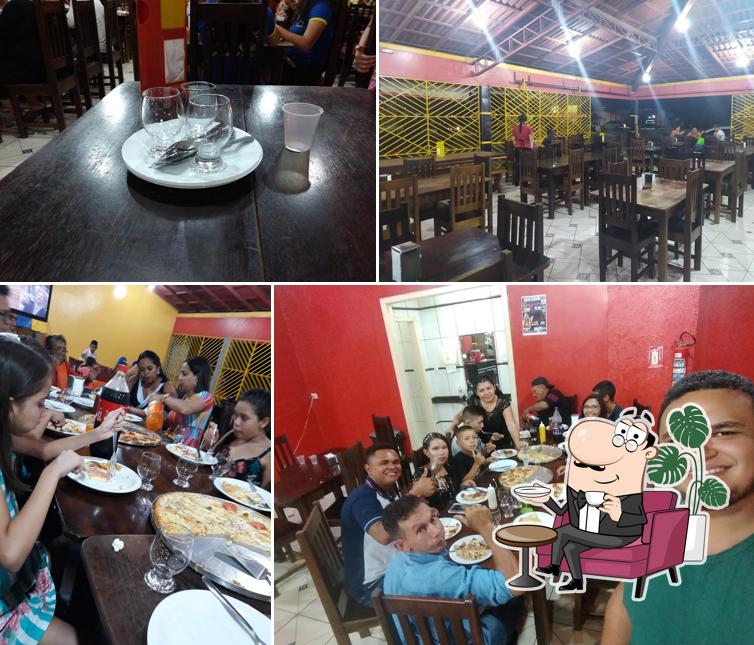 O interior do Pizzaria Moura