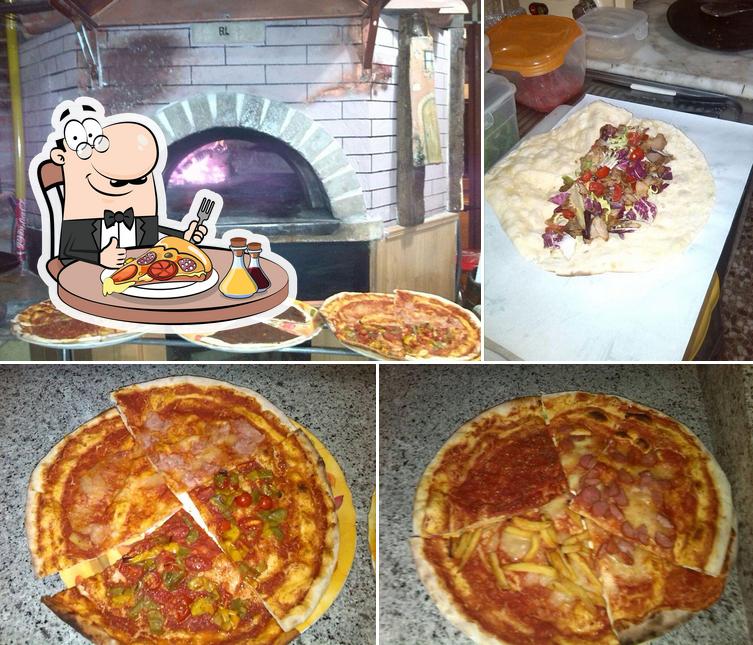 Prenditi una pizza a Pizzeria "IL CAPRICCIO" Bascetta Leonardo