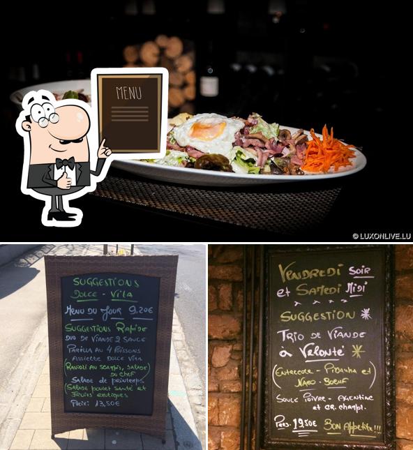 Take a look at the photo showing blackboard and food at Restaurant Dolce Vita