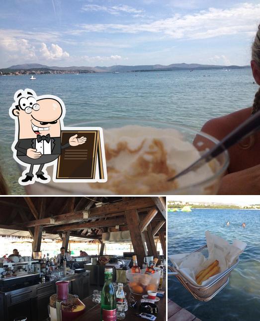 Dai un’occhiata alla immagine che mostra la esterno e bancone da bar di Beach Bar Lagoon