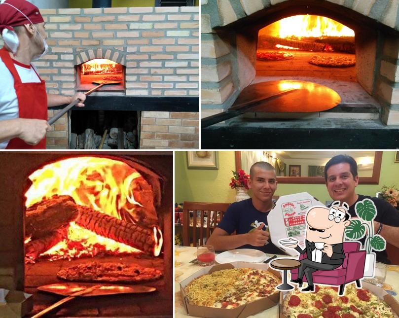 O interior do Angelo Pizzas