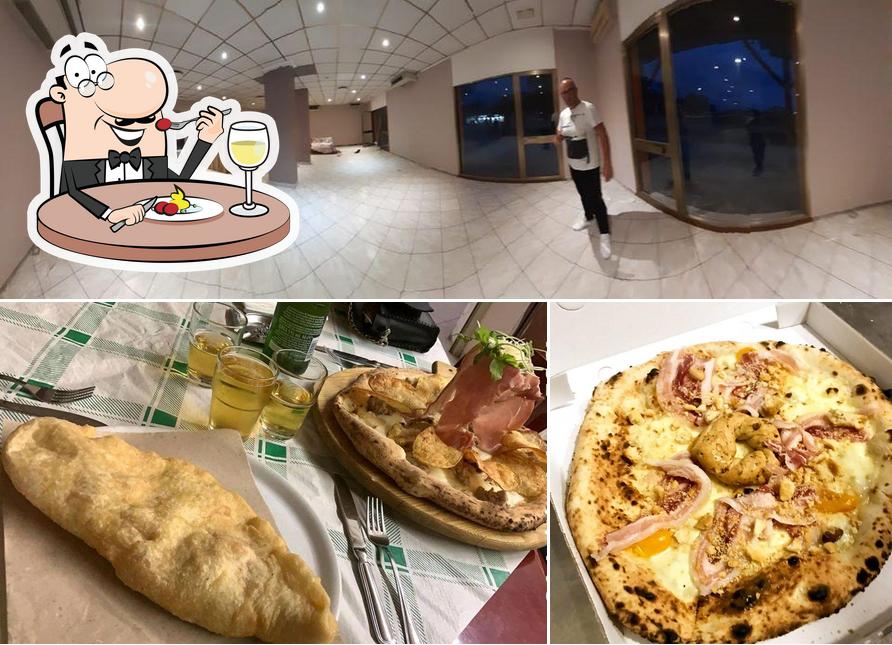 Questa è la immagine che raffigura la cibo e interni di Pizzeria & Paninoteca "Regina Margherita "