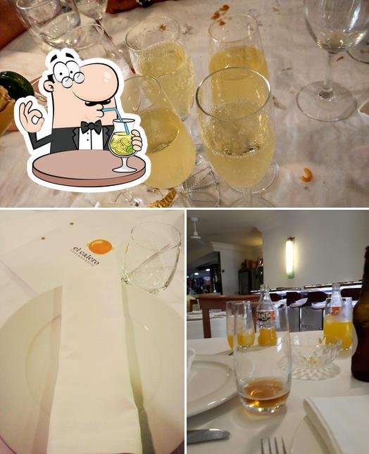 Take a look at the picture showing drink and interior at El Calero Restaurante