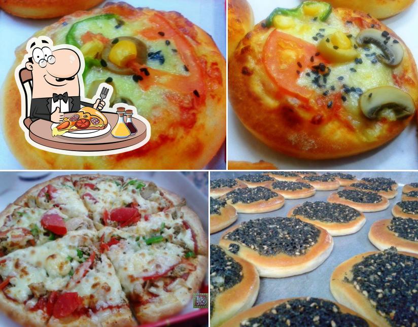 Probiert diverse Arten von Pizza