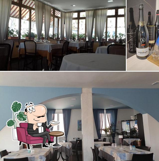 Guarda la foto che mostra la interni e bevanda di Ristorante del Golfo