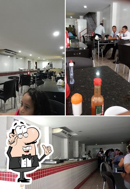 O interior do Elite Grill Restaurante e Pizzaria Delivery