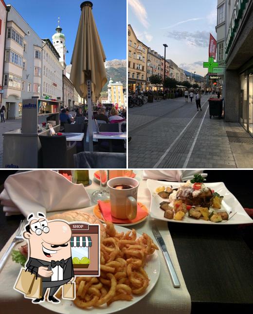 La extérieur et table à manger du restaurant