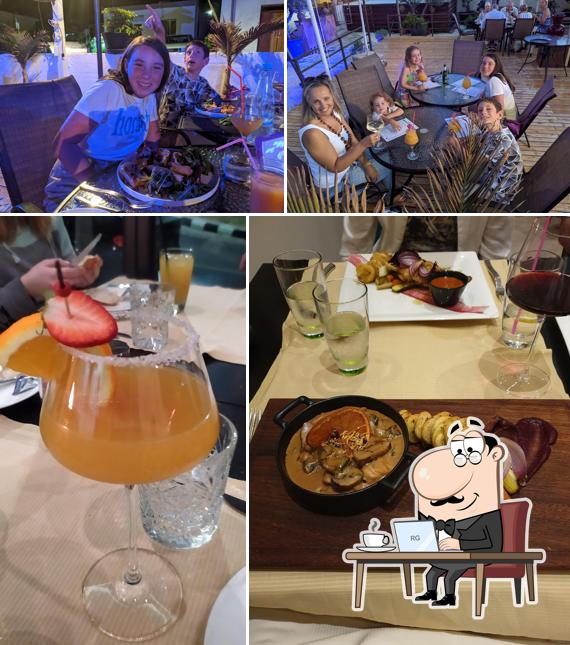 The photo of Olivio Mediterranean Restaurant’s interior and drink